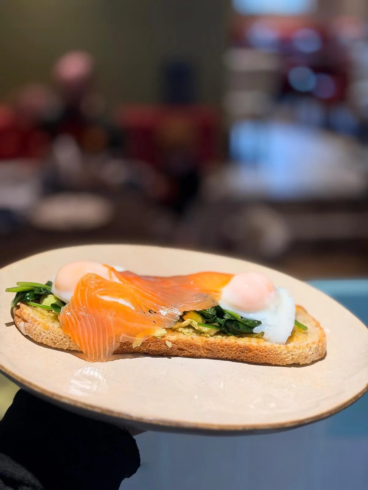 Smoked salmon, poached eggs, and avocado on toast